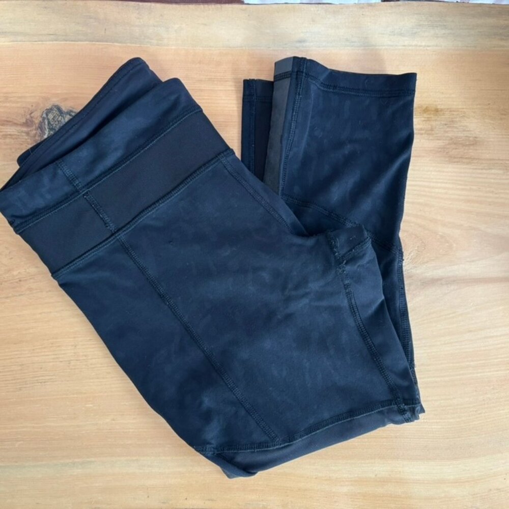 Donating Soon! Lululemon black crop leggings with sheer accent
